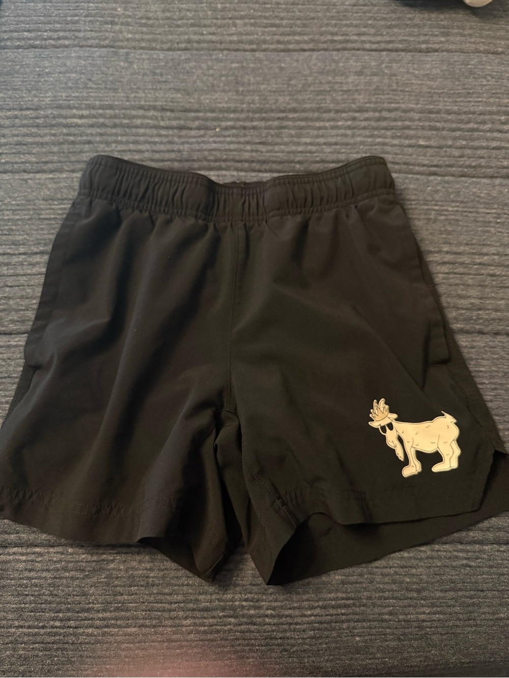 Youth Boys Black GOAT USA shorts size LARGE